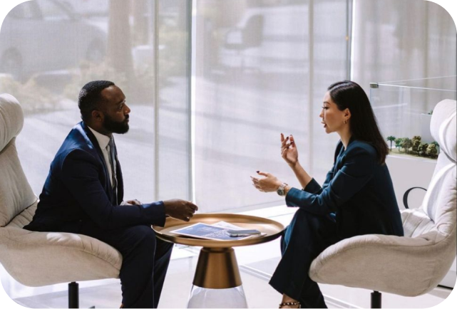 How to Open an LLC for Non US Residents: 8 Simple Steps to Get Started Professionals in a business meeting